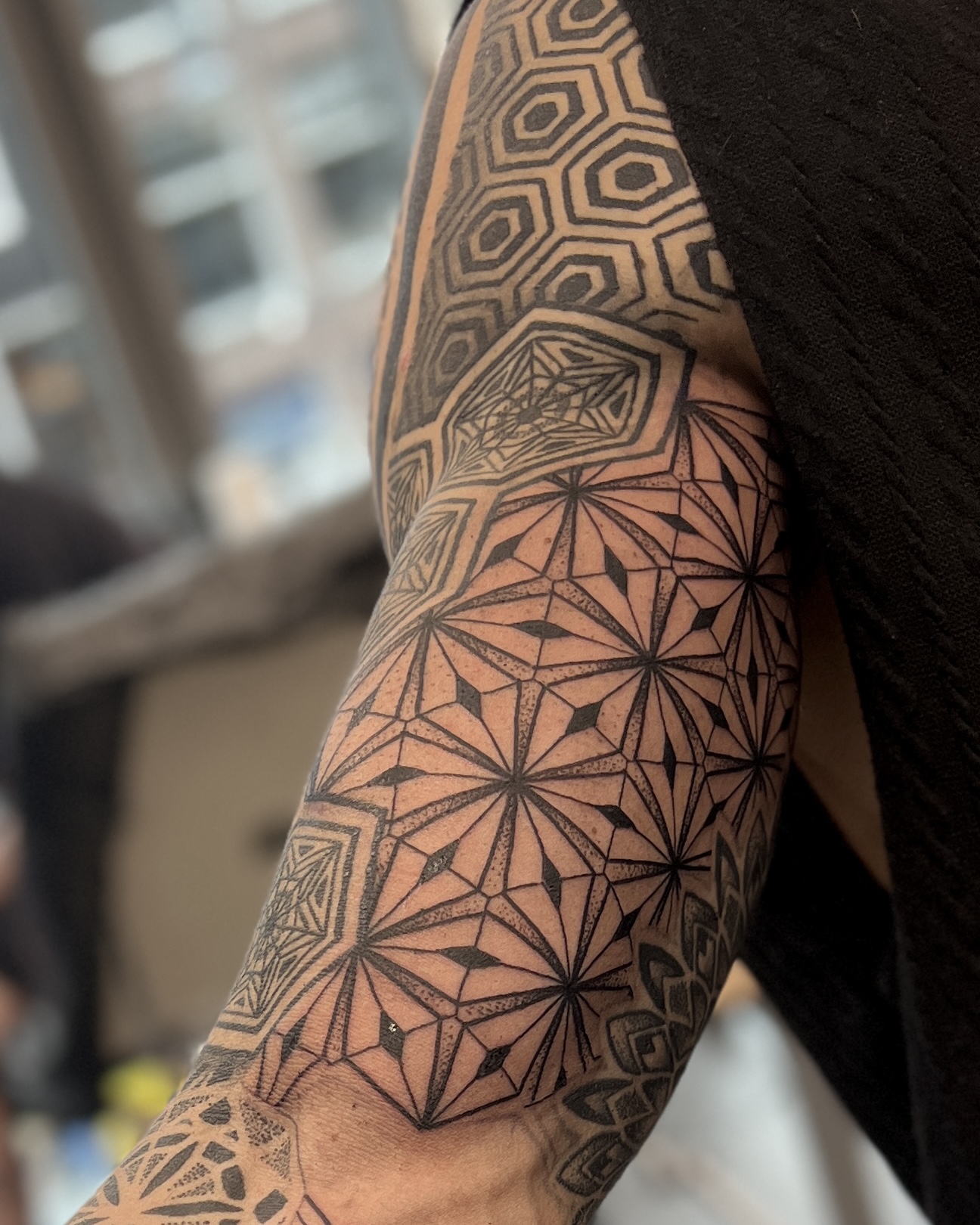 Geometric tattoo Amsterdam — James Nidecker